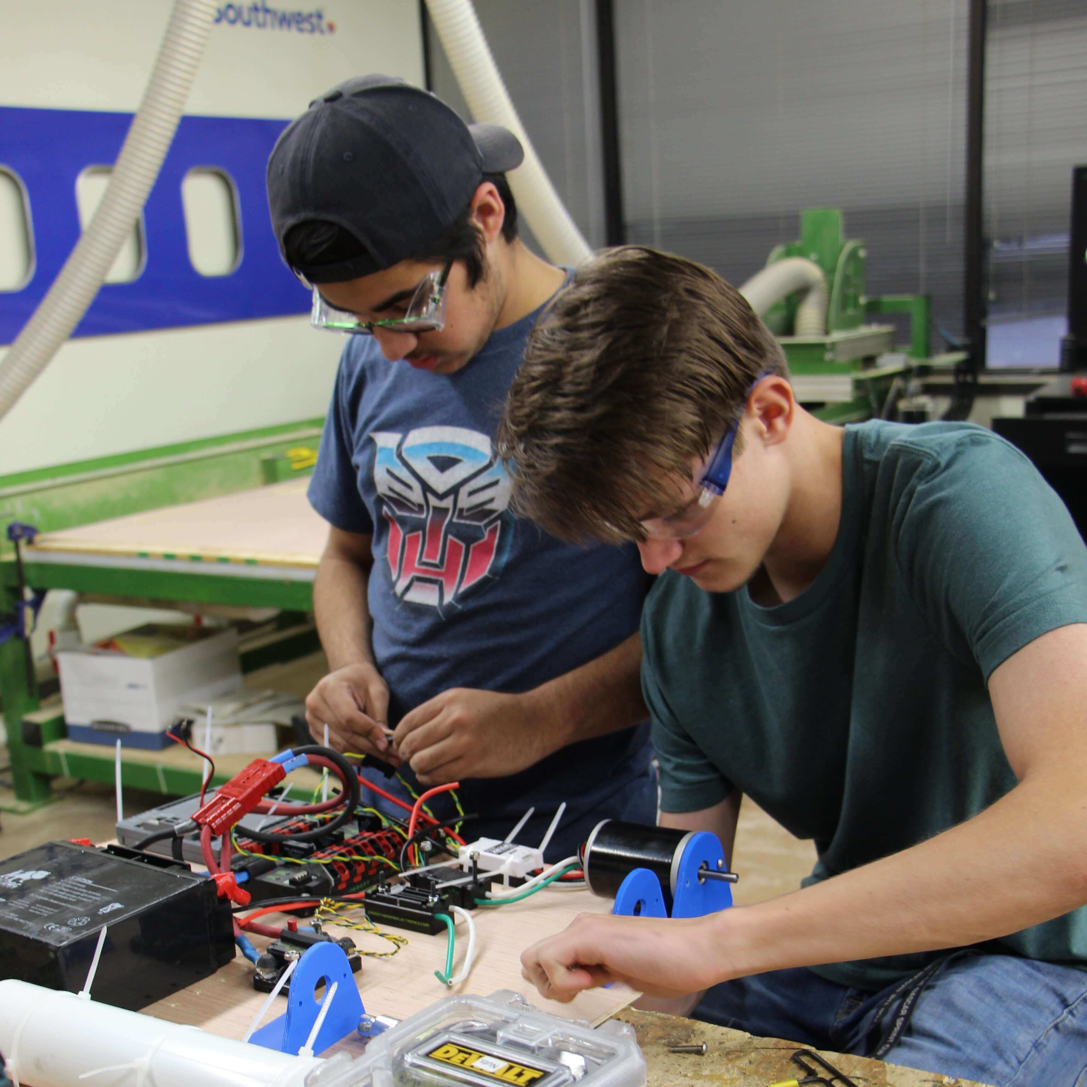 Tauseef working on a robotics test bench